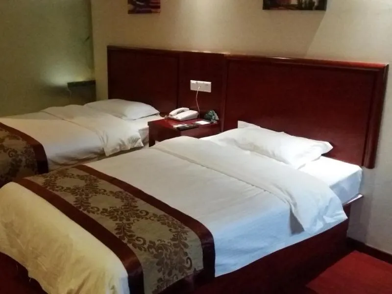 Bed in GreenTree Inn Anhui Bozhou Mengcheng Zhuangzi Road Express Hotel