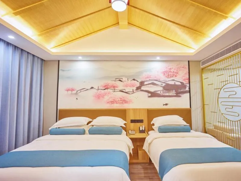 Bed in GreenTree Inn Huangshan TangKou Beauty Spot South Gate Transfer Center Business Hotel