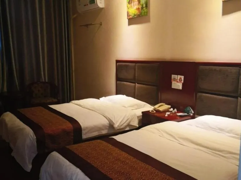 Bed in GreenTree Inn AnHui LuAn HuoQiu JianXing Road Express Hotel