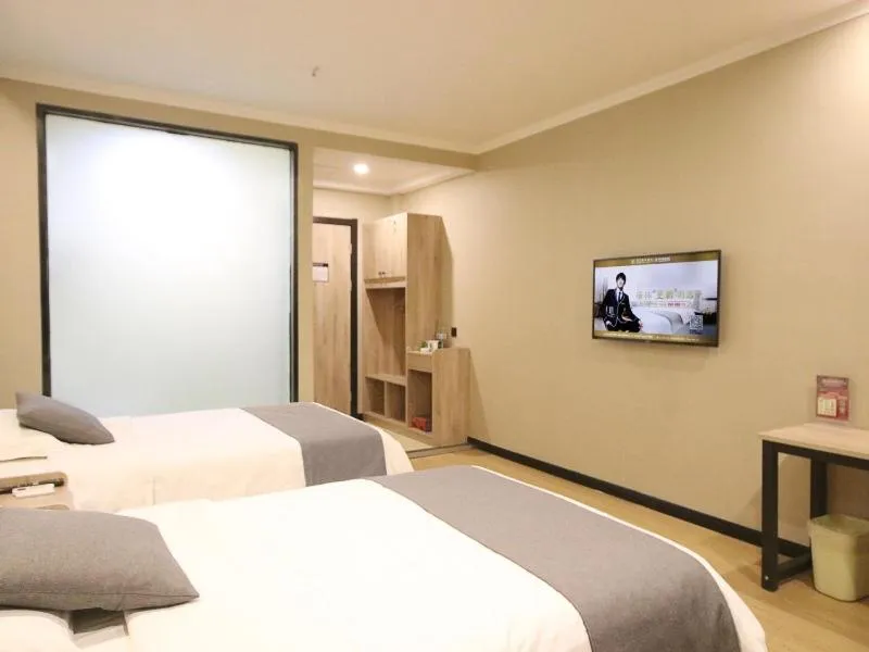 Bed in GreenTree Inn ShanDong ZaoZhuang TengZhou FuQian Road LongQuan Square Business Hotel