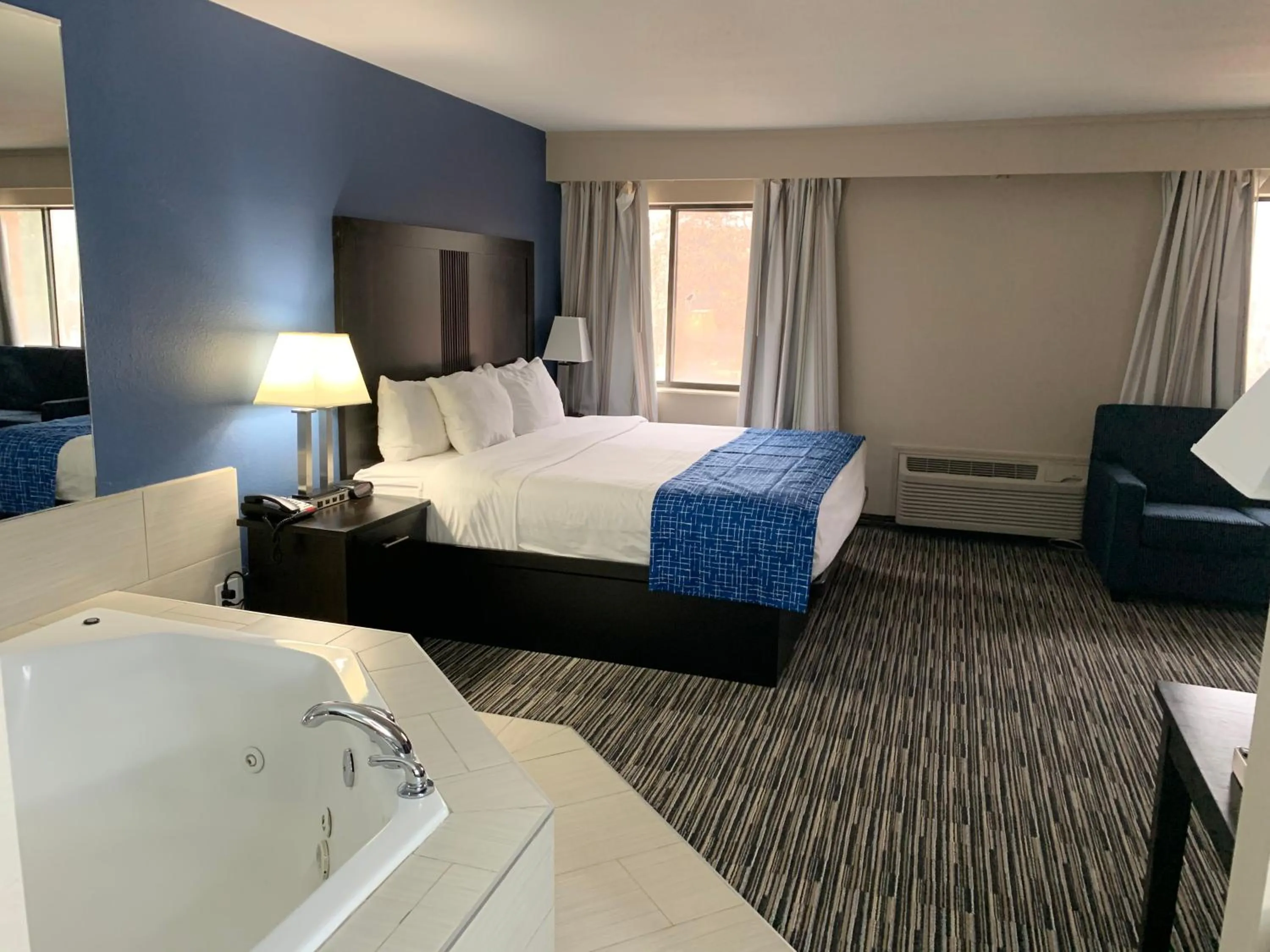 Bed in Baymont Inn & Suites