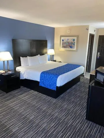 Bed in Baymont Inn & Suites