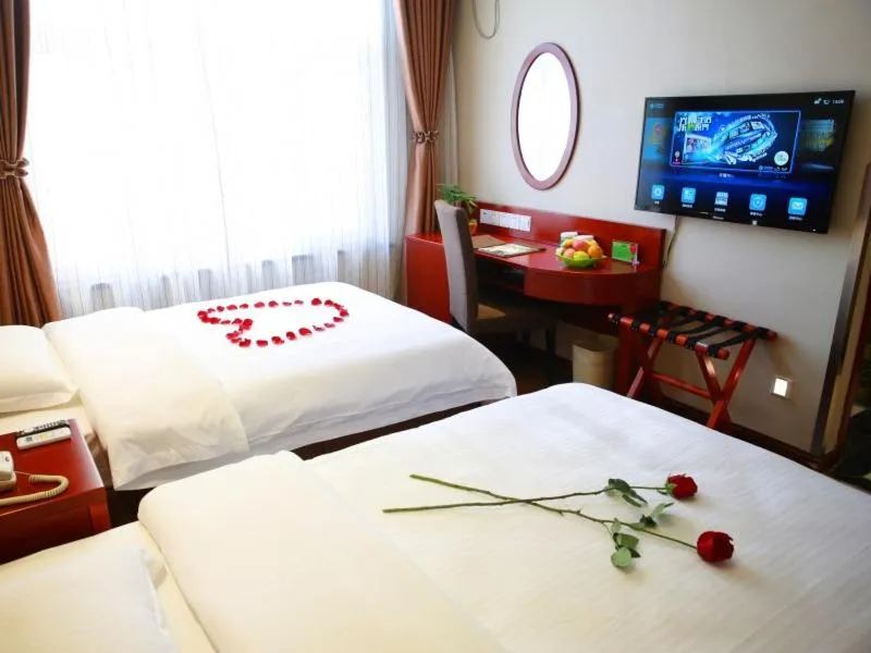 Bed in GreenTree Inn Xinjiang Bole Wanxianghui Express Hotel