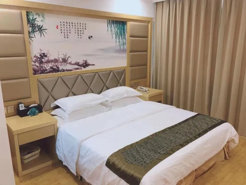 Bed in GreenTree Inn AnHui HuangShan She County HuiZhou Ancient City Middle HuangShan Road Business Hotel