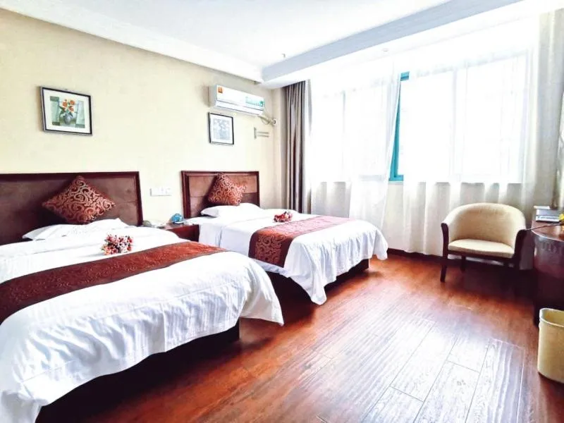 Bed in GreenTree Inn JiangSu WuXi BaShi HuaXiaQingCheng XiGang Road Shell Hotel