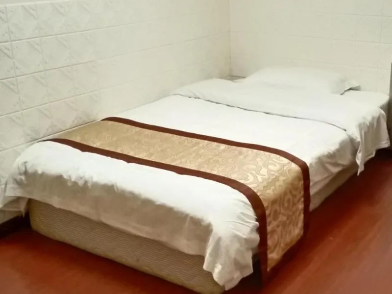 Bed in GreenTree Inn Jiangsu Suzhou International Education Zone Shihu Express Hotel