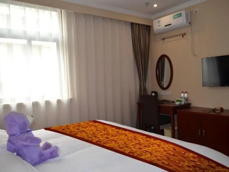 Bed in GreenTree Inn JiangSu NanTong BaiDian Town XiuShuiYuan Express Hotel