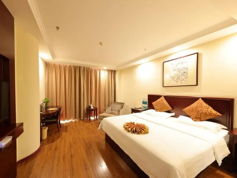 Bed in GreenTree Inn JiangSu HuaiAn University Town Science and Technology Avenue Business Hotel