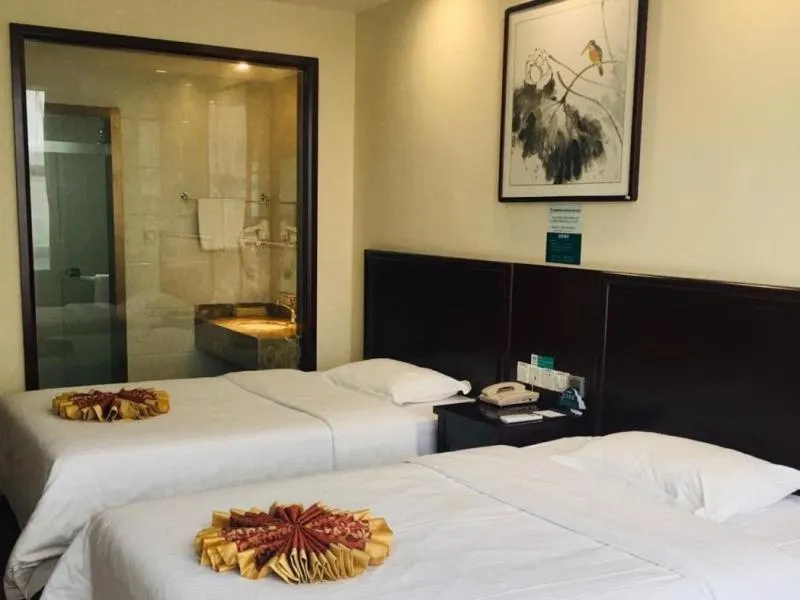 Bed in GreenTree Inn JiangSu HuaiAn University Town Science and Technology Avenue Business Hotel