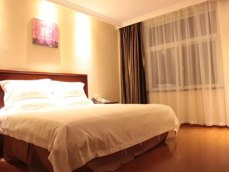 Bed in GreenTree Inn Jiangsu Huaian Economic Development Zone Hechang Road Business Hotel