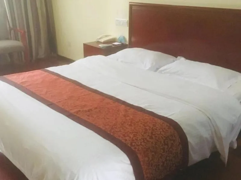 Bed in GreenTree Inn Jiangsu Taizhou Xinghua Zhangguo Bus Station Express Hotel