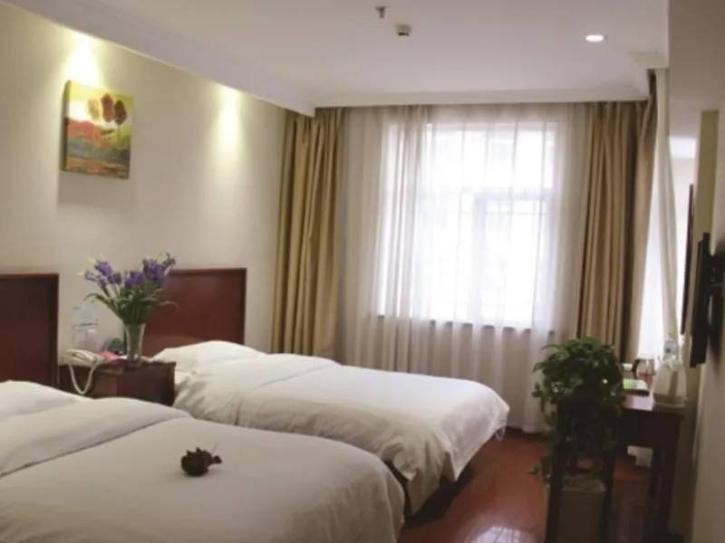 Bed in GreenTree Inn Jiangsu Taizhou Xinghua Zhangguo Bus Station Express Hotel