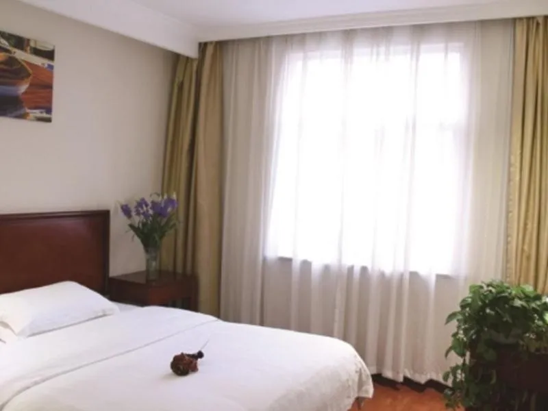 Bed in GreenTree Inn Jiangsu Taizhou Xinghua Zhangguo Bus Station Express Hotel