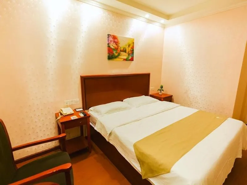 Bed in GreenTree Inn Zhejiang Shaoxing Paojiang Industrial Park Tanggong Road Business Hotel