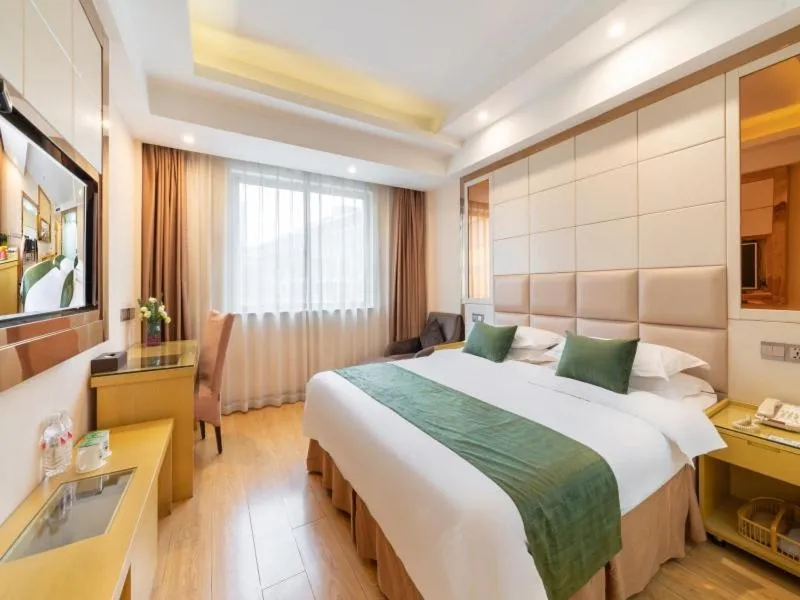 Bed in GreenTree Inn Zhejiang Jinhua Yiwu International Trade City Changchun Street Shell Hotel