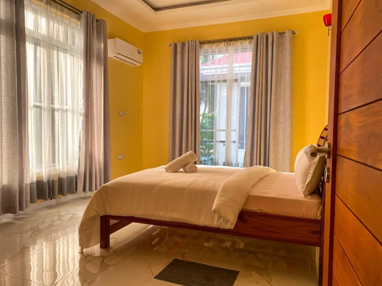 Bed in SUN n SAND BEACH RESORT