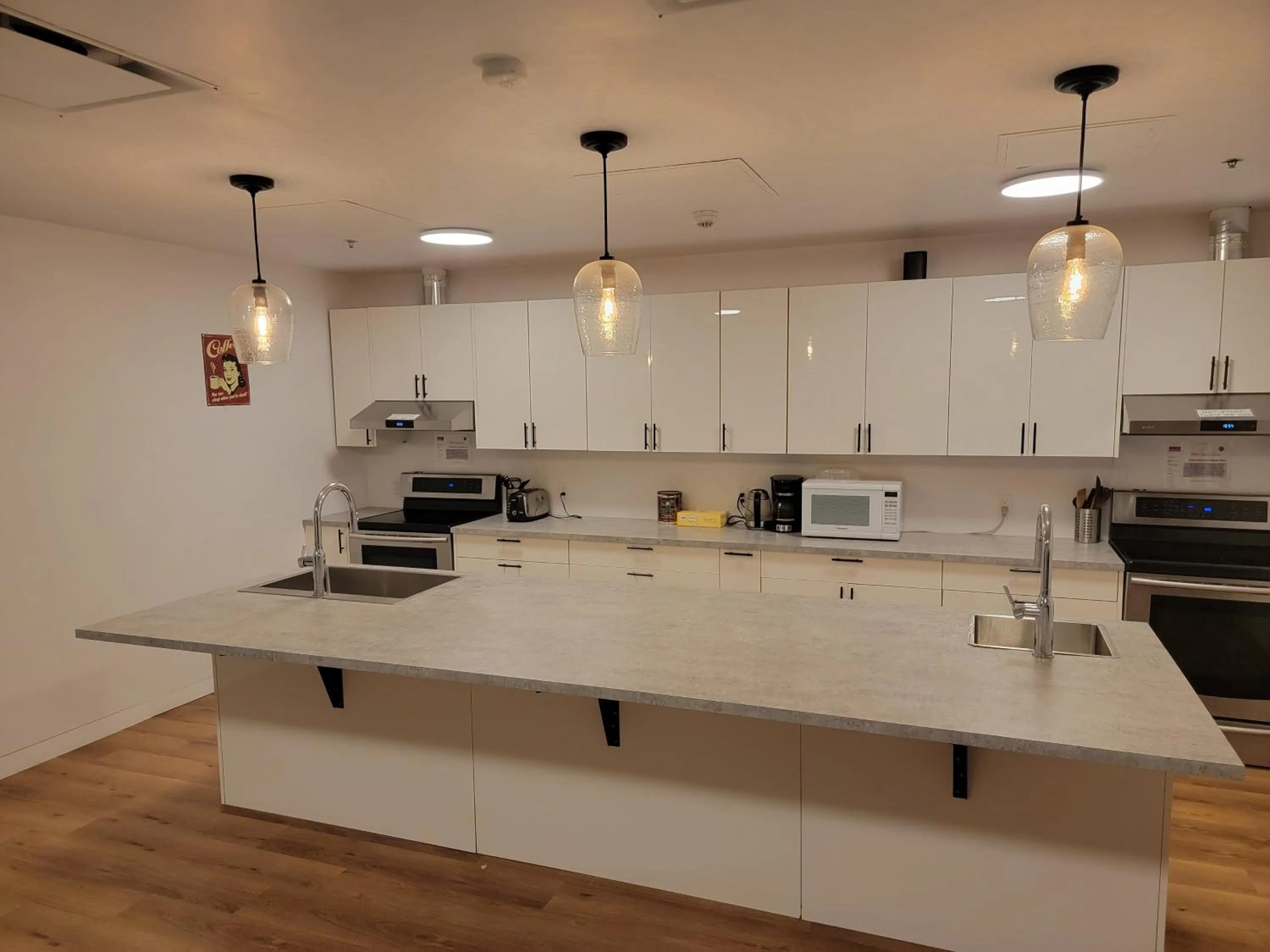 Communal kitchen in Wicked Hostels - Calgary