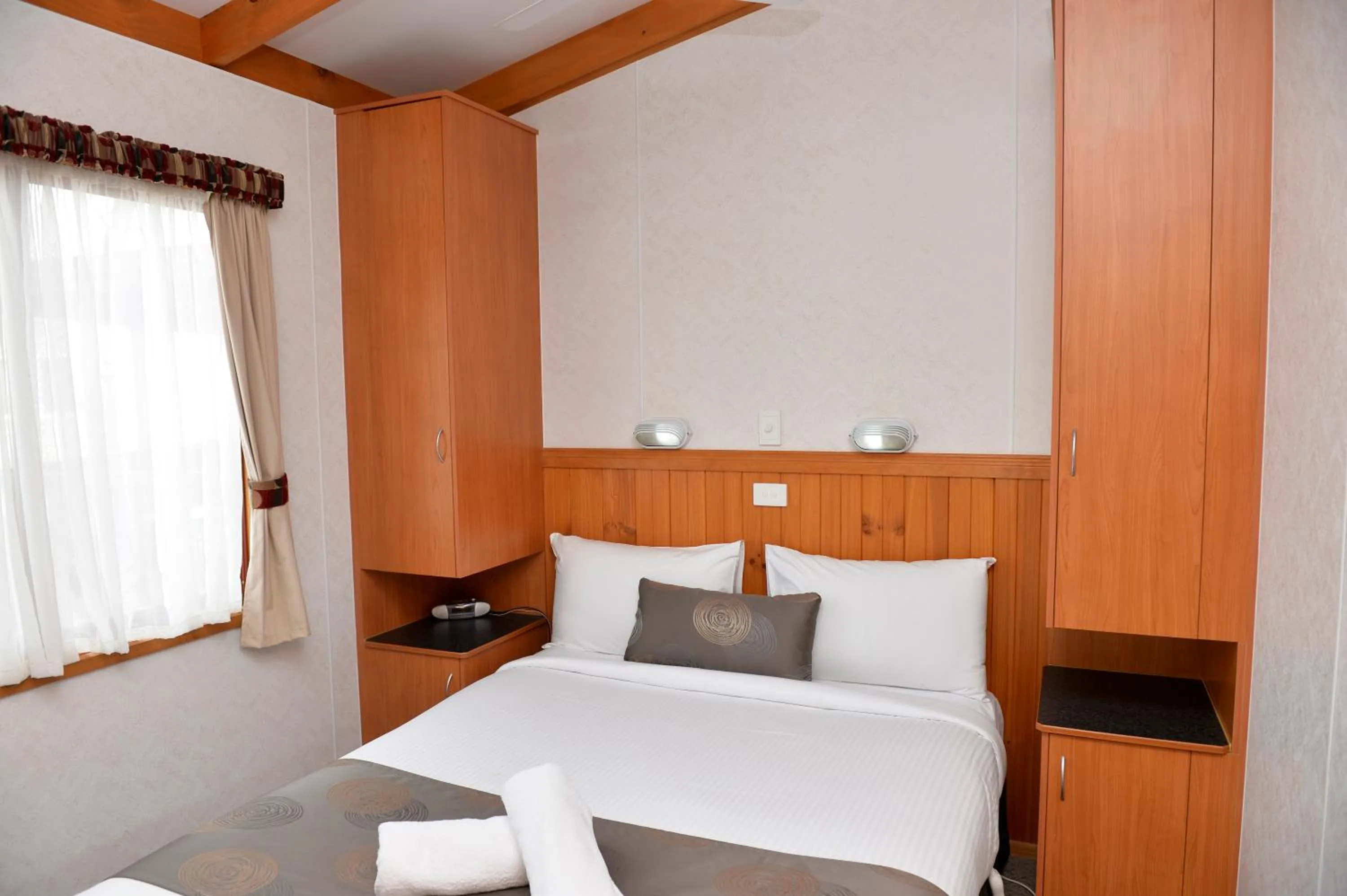 Bed in Riverside Cabin Park