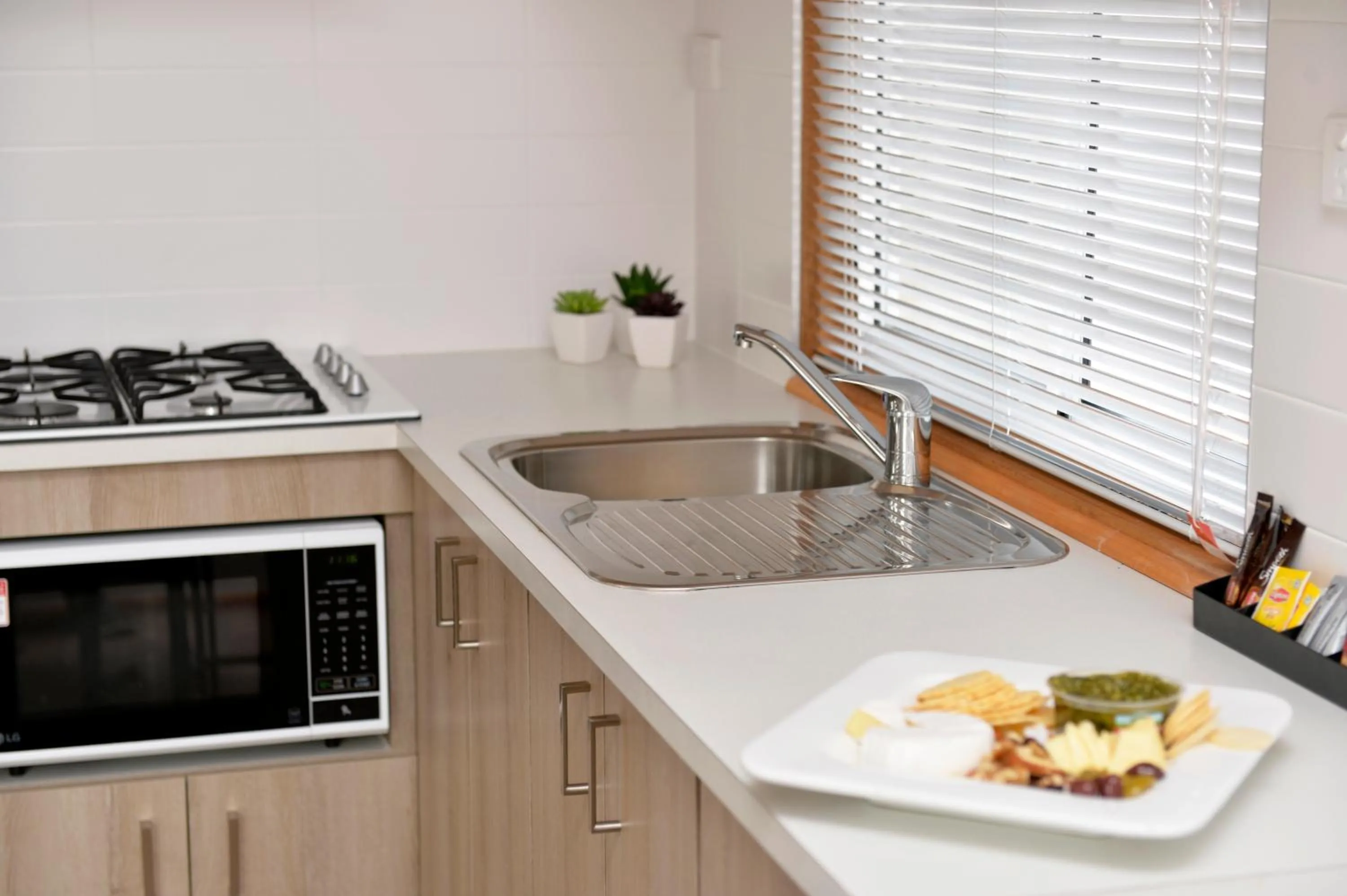 Kitchen or kitchenette in Riverside Cabin Park