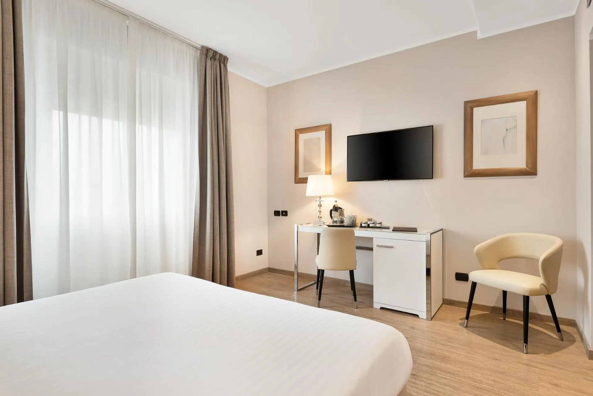 Bed in Hotel Excelsior