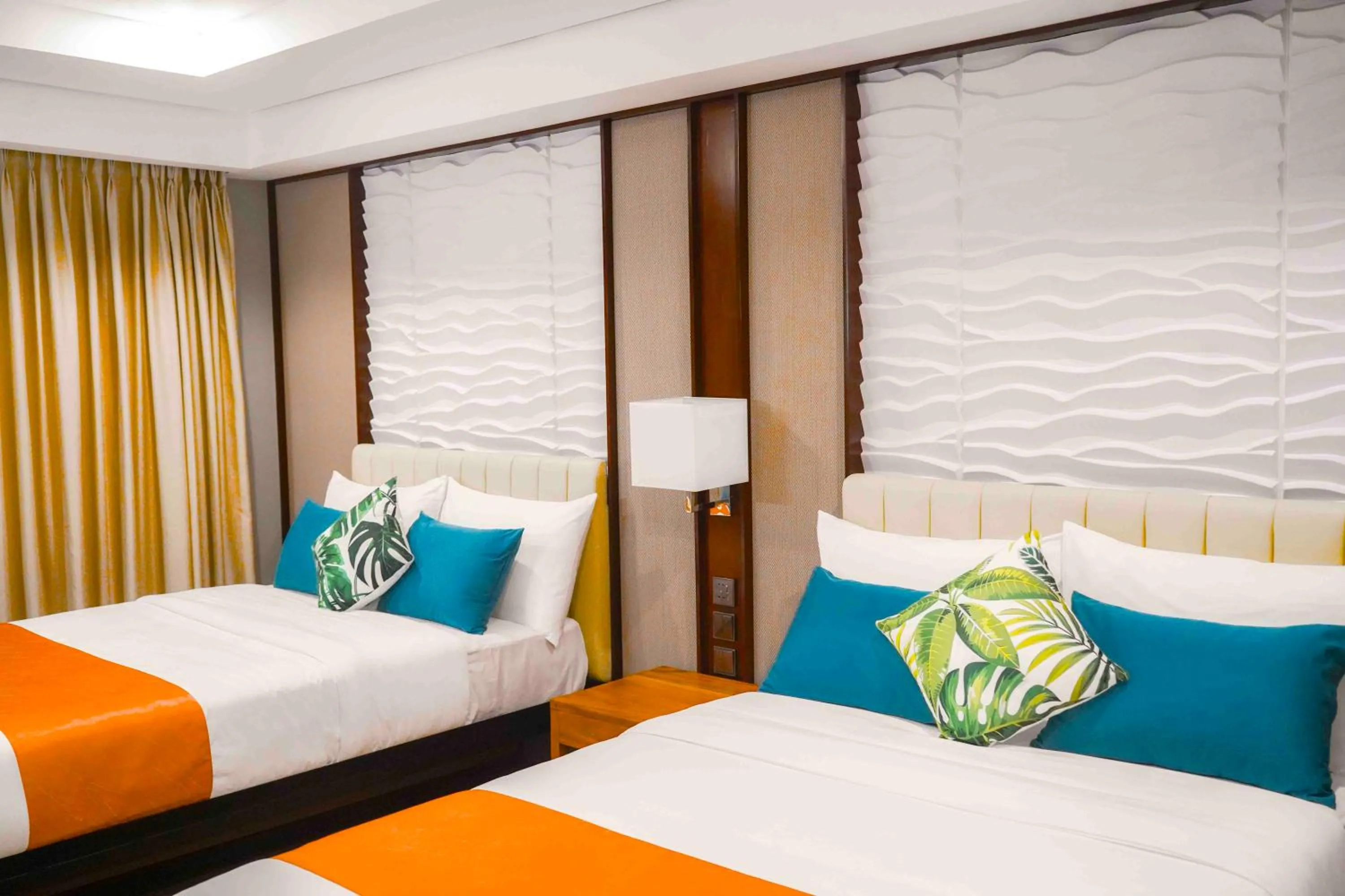 Bed in Puerto de San Juan Beach Resort Hotel and Residences