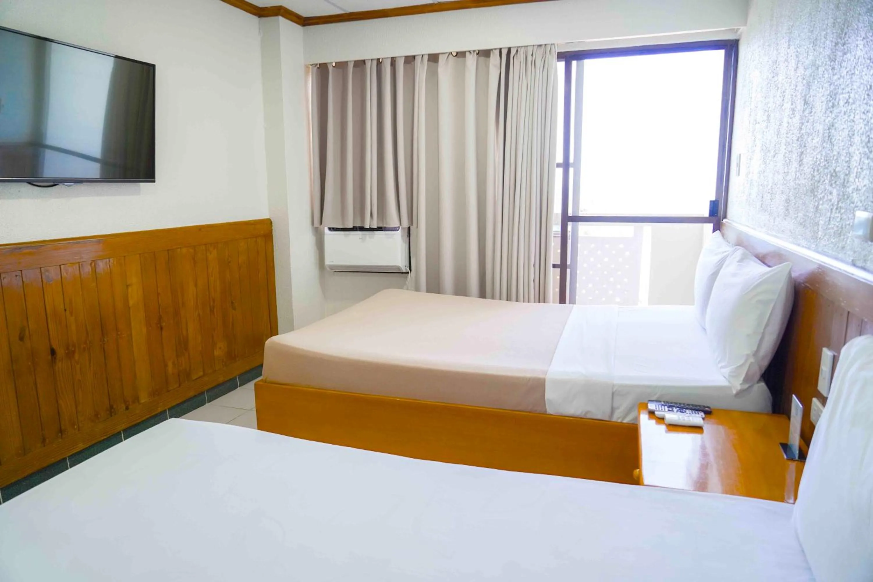 Bed in Puerto de San Juan Beach Resort Hotel and Residences