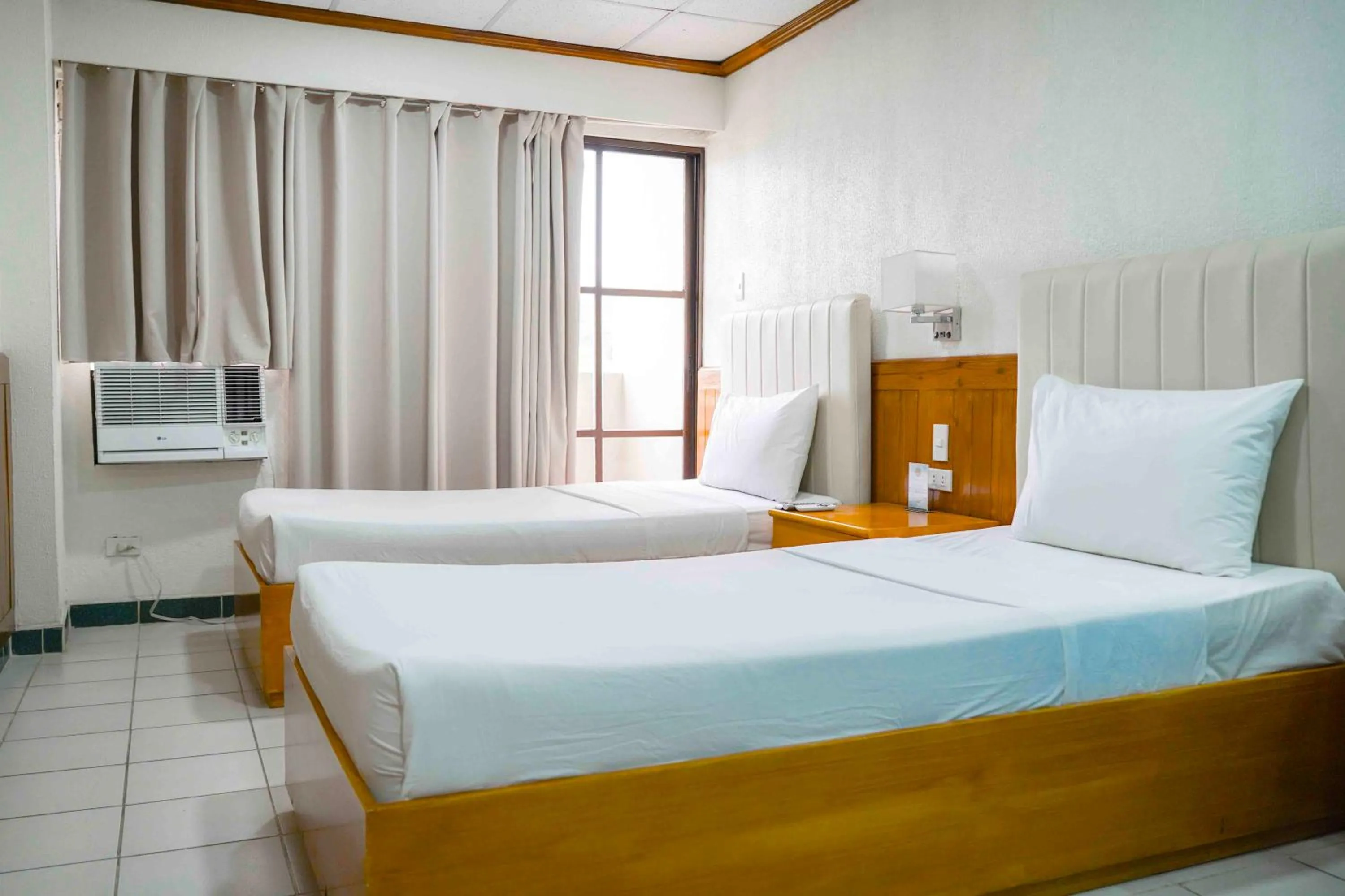 Bed in Puerto de San Juan Beach Resort Hotel and Residences