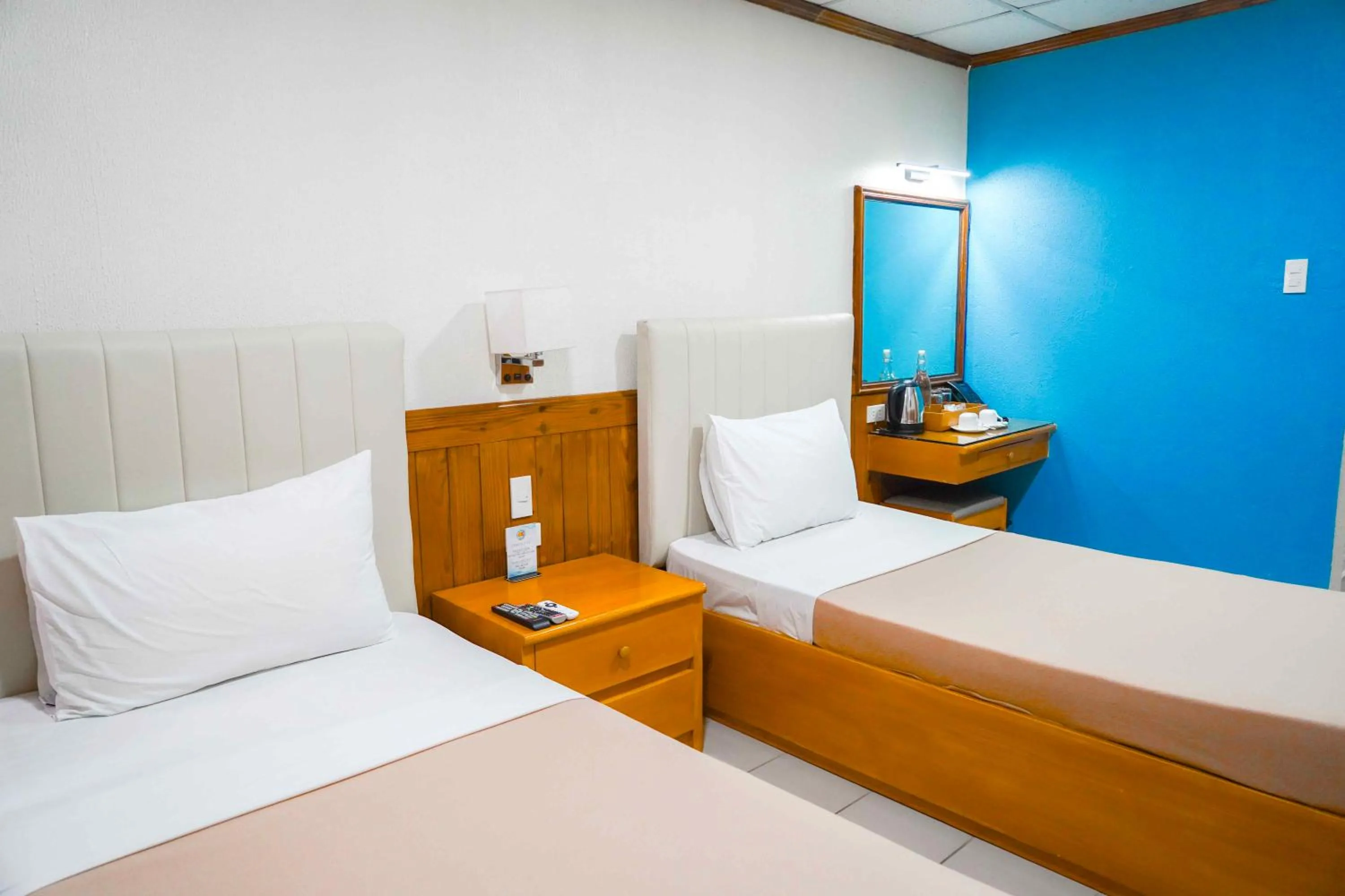 Bed in Puerto de San Juan Beach Resort Hotel and Residences