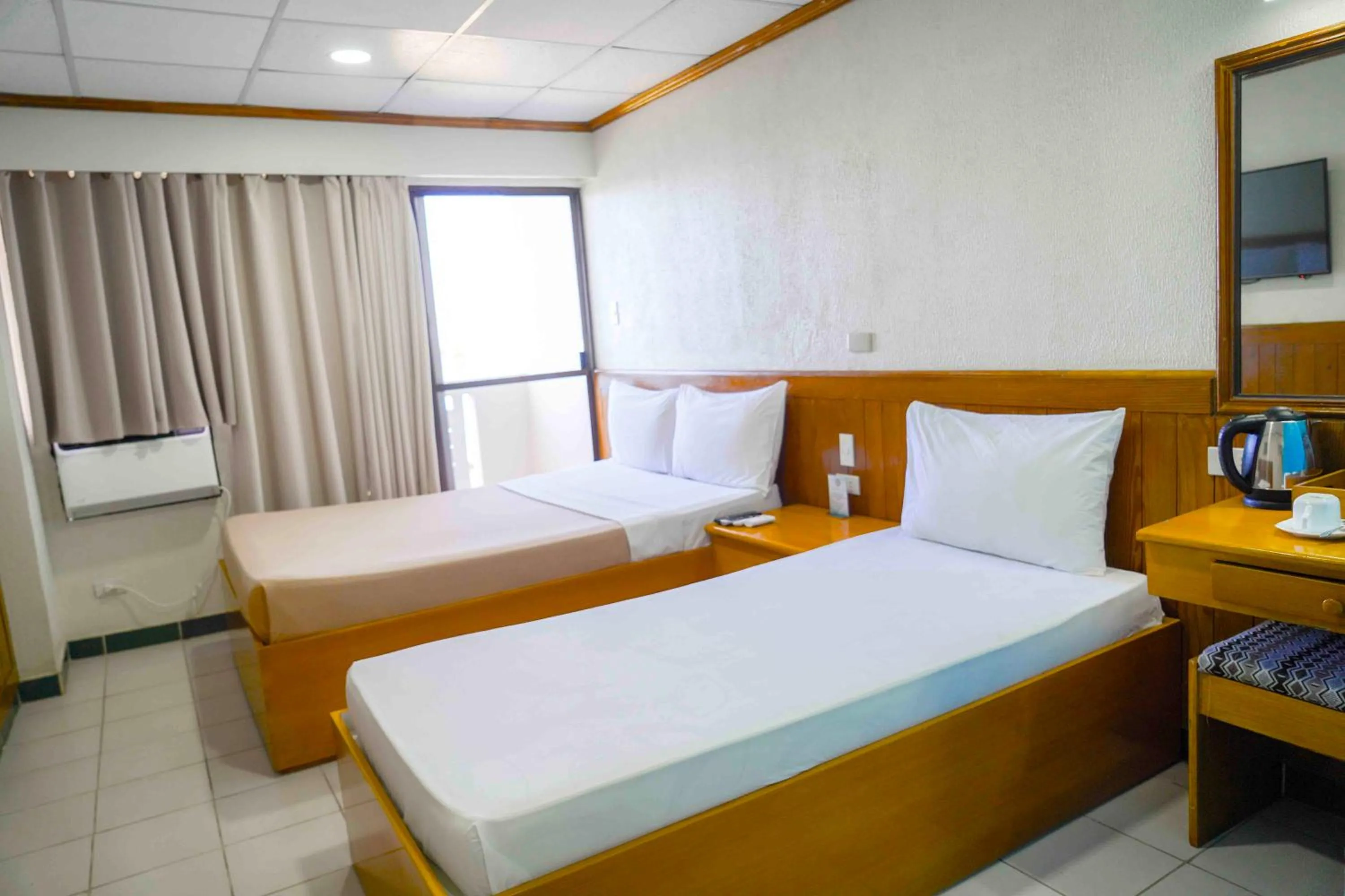 Bed in Puerto de San Juan Beach Resort Hotel and Residences