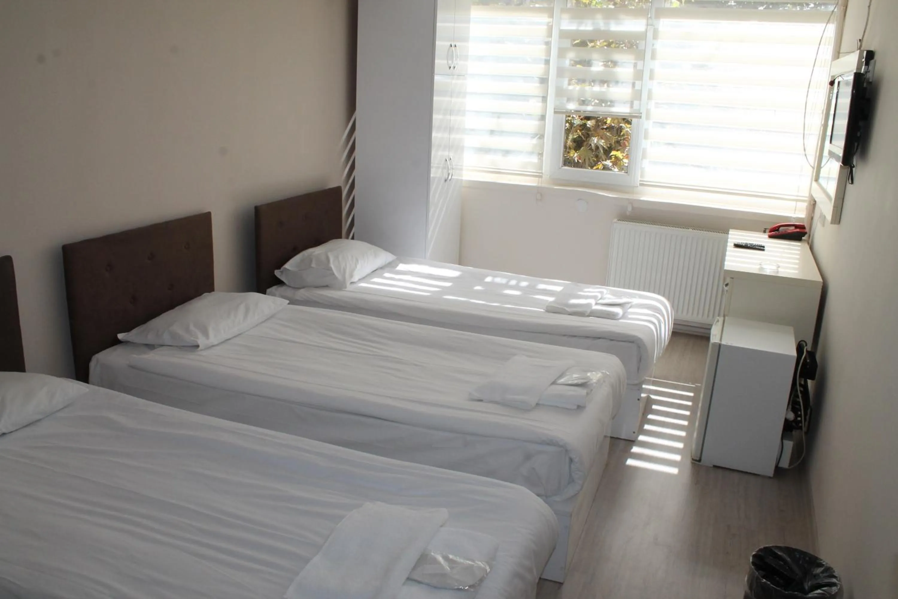 Bed in Hotel Abro Necatibey