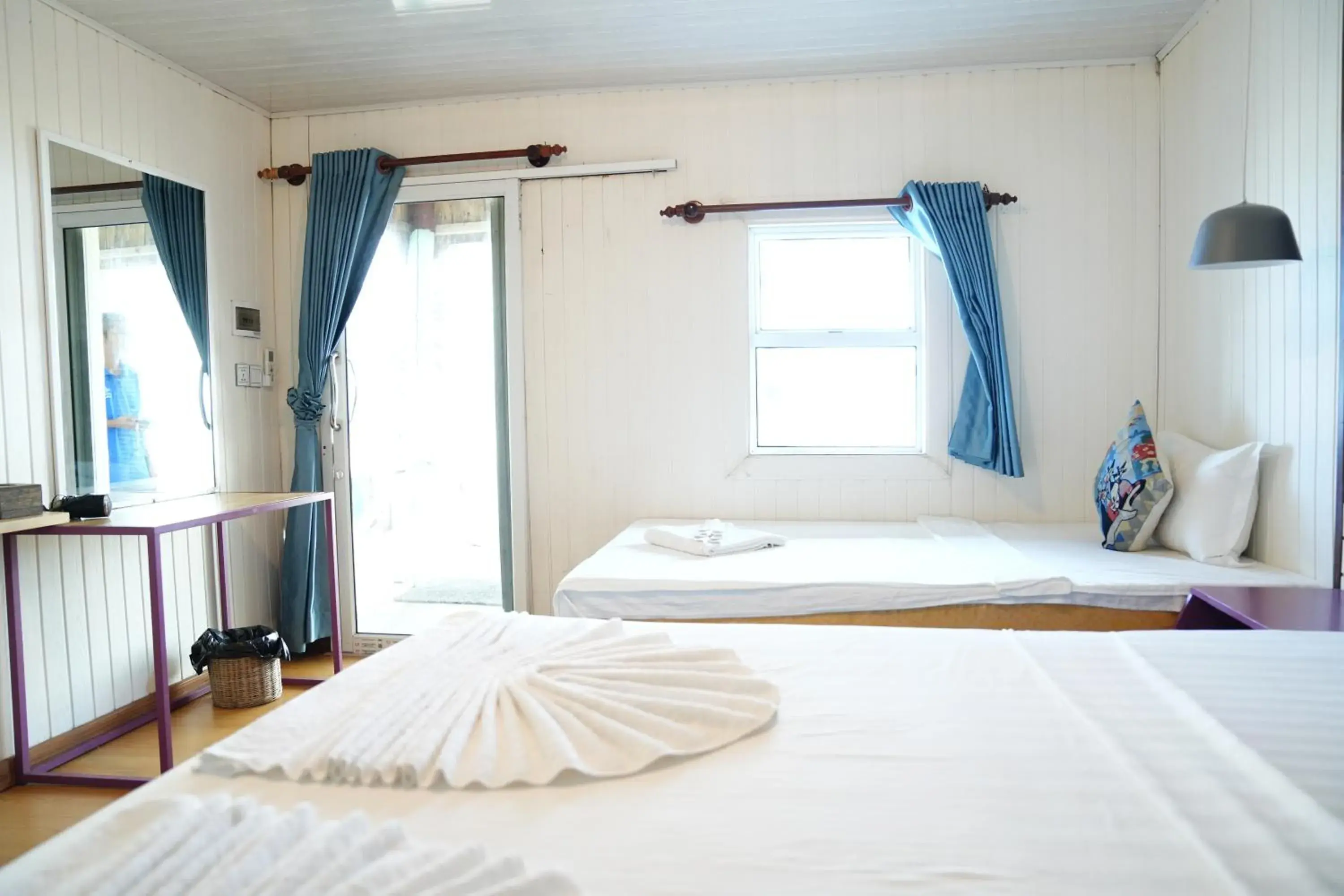 Bed in Sandy Beach Bungalows by EHM Bed in Sandy Beach Bungalows by EHM