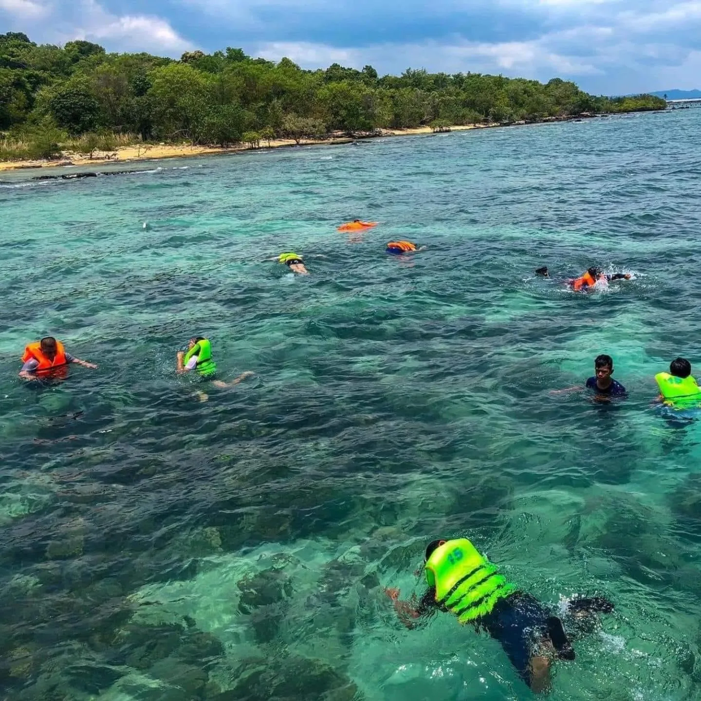 Snorkeling in Sandy Beach Bungalows by EHM