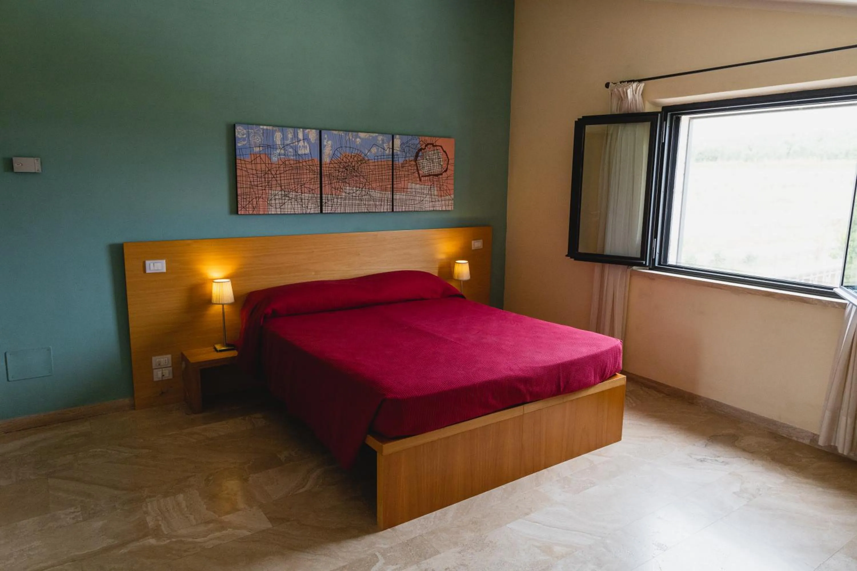 Bed in Hotel Poggio Bertino