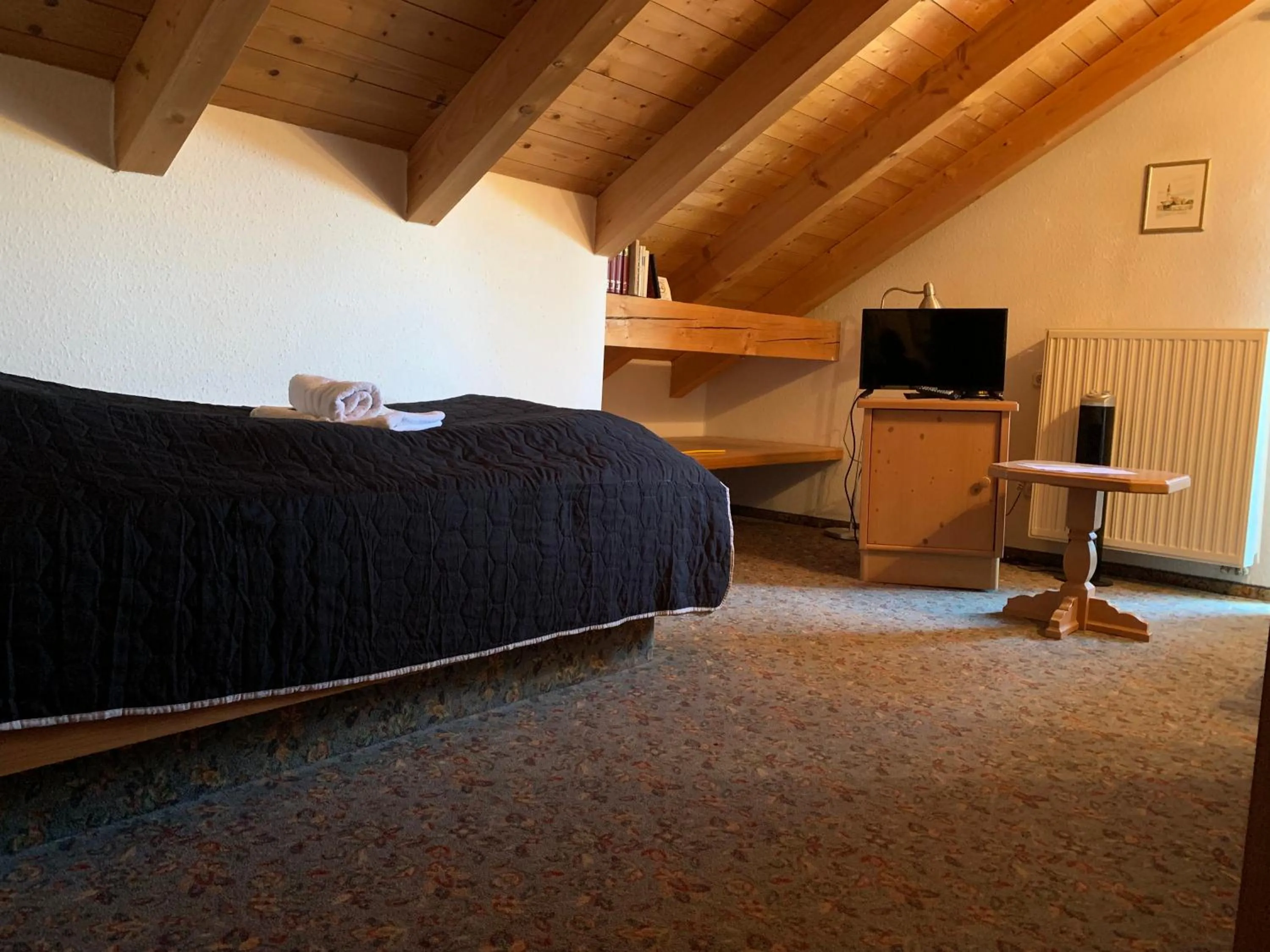 Photo of the whole room, Bed in Gasthof Sonnenheim