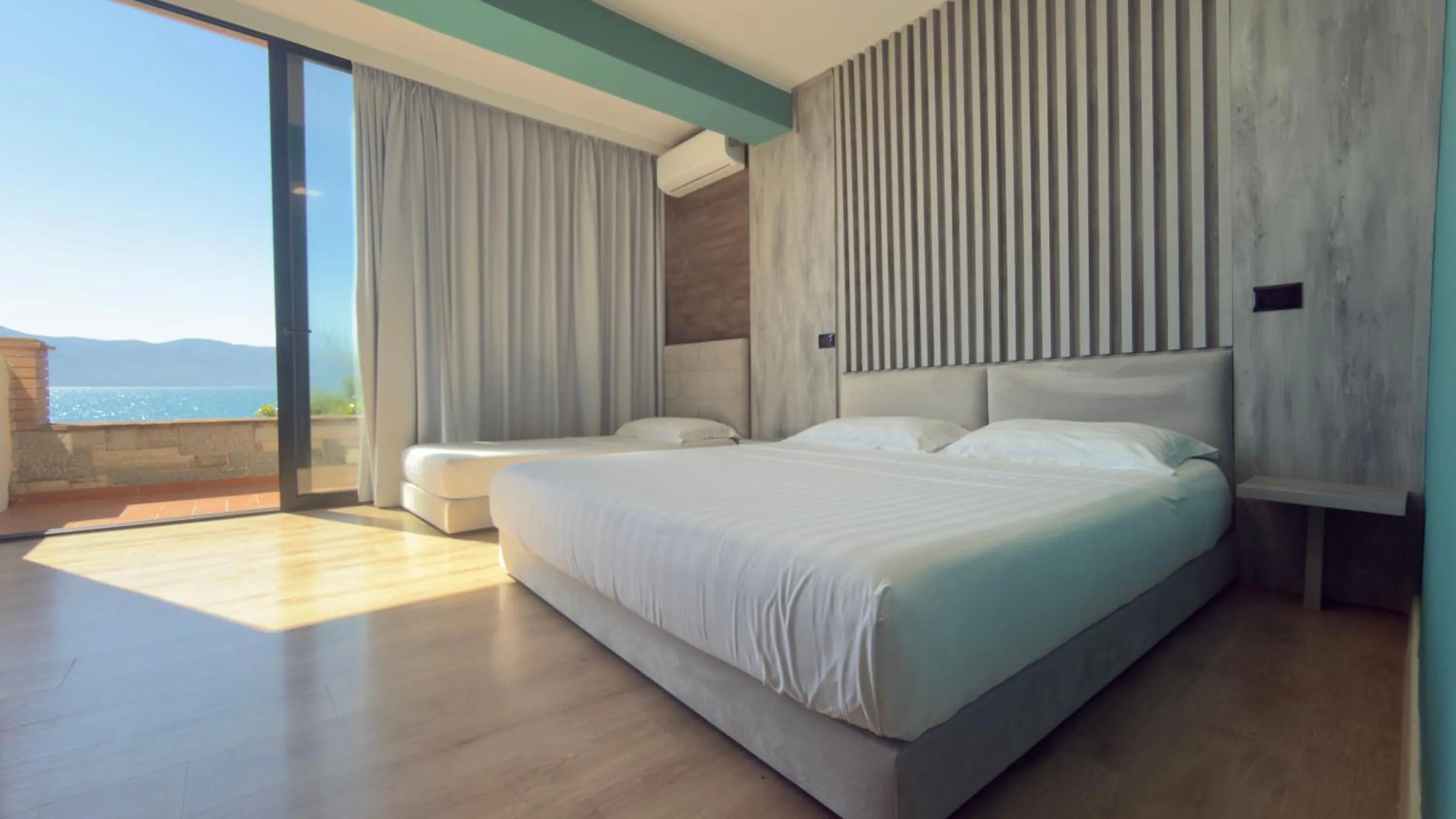 Bed in Hotel Zhironi