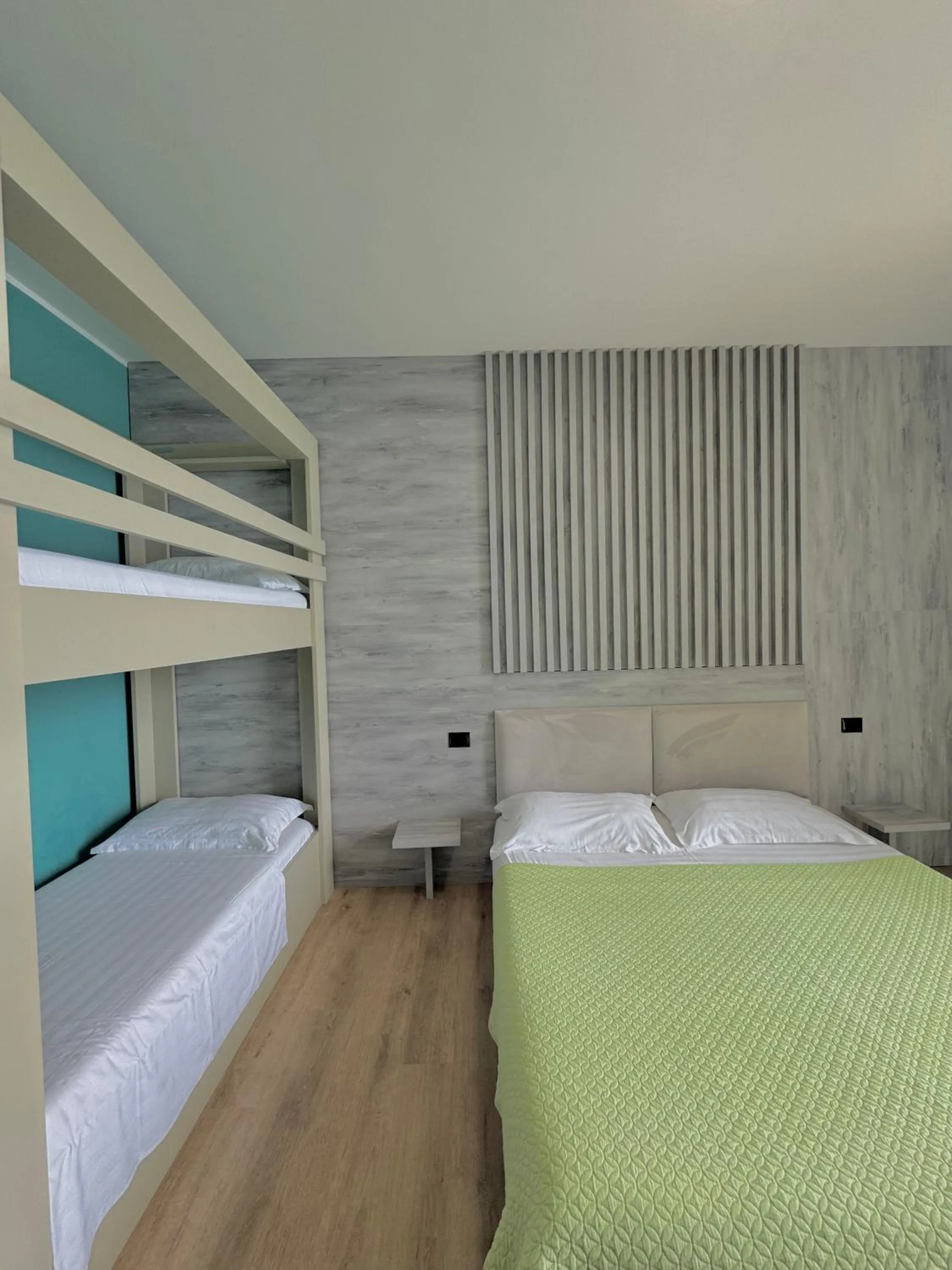 Bed in Hotel Zhironi