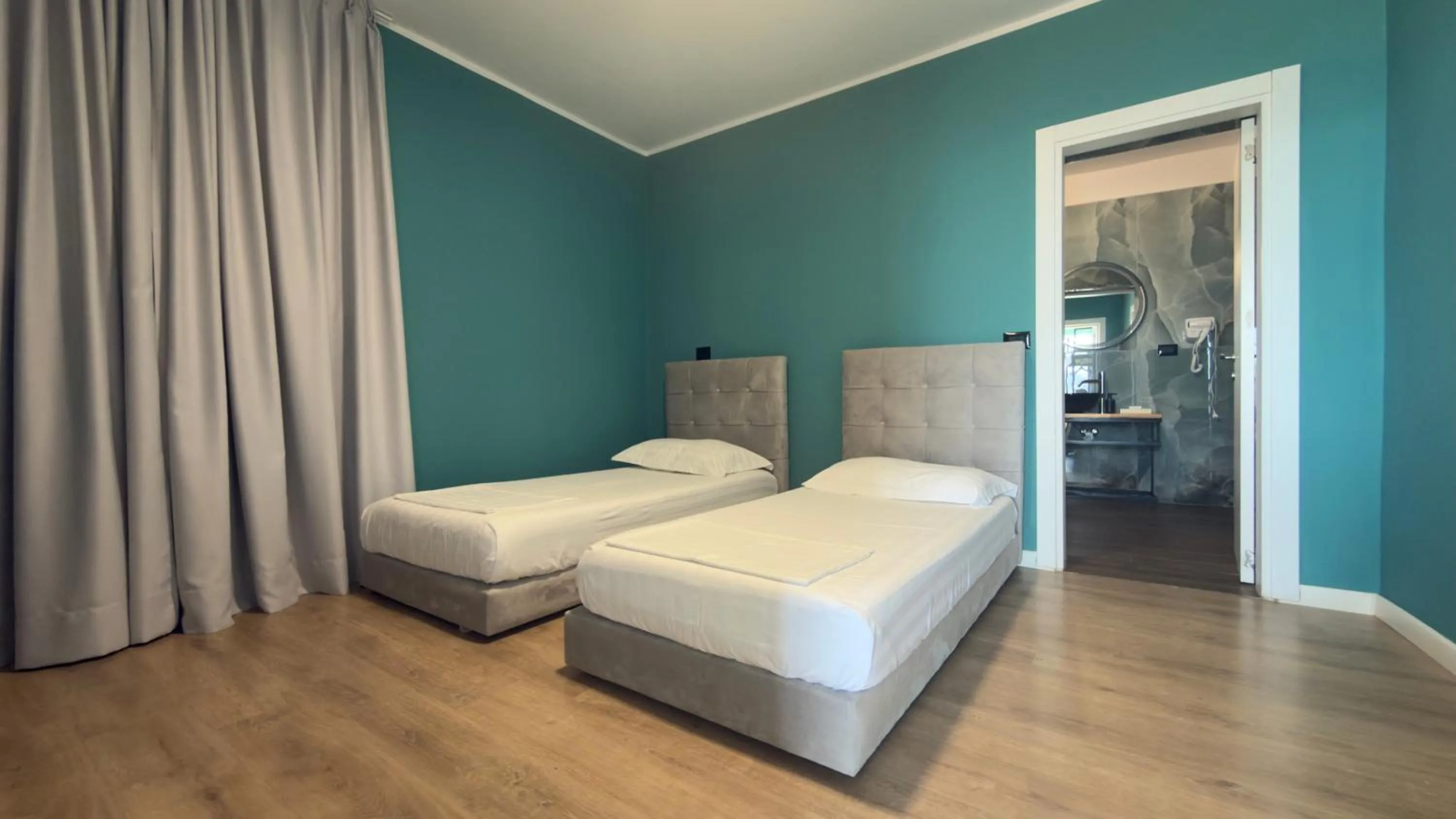 Bed in Hotel Zhironi