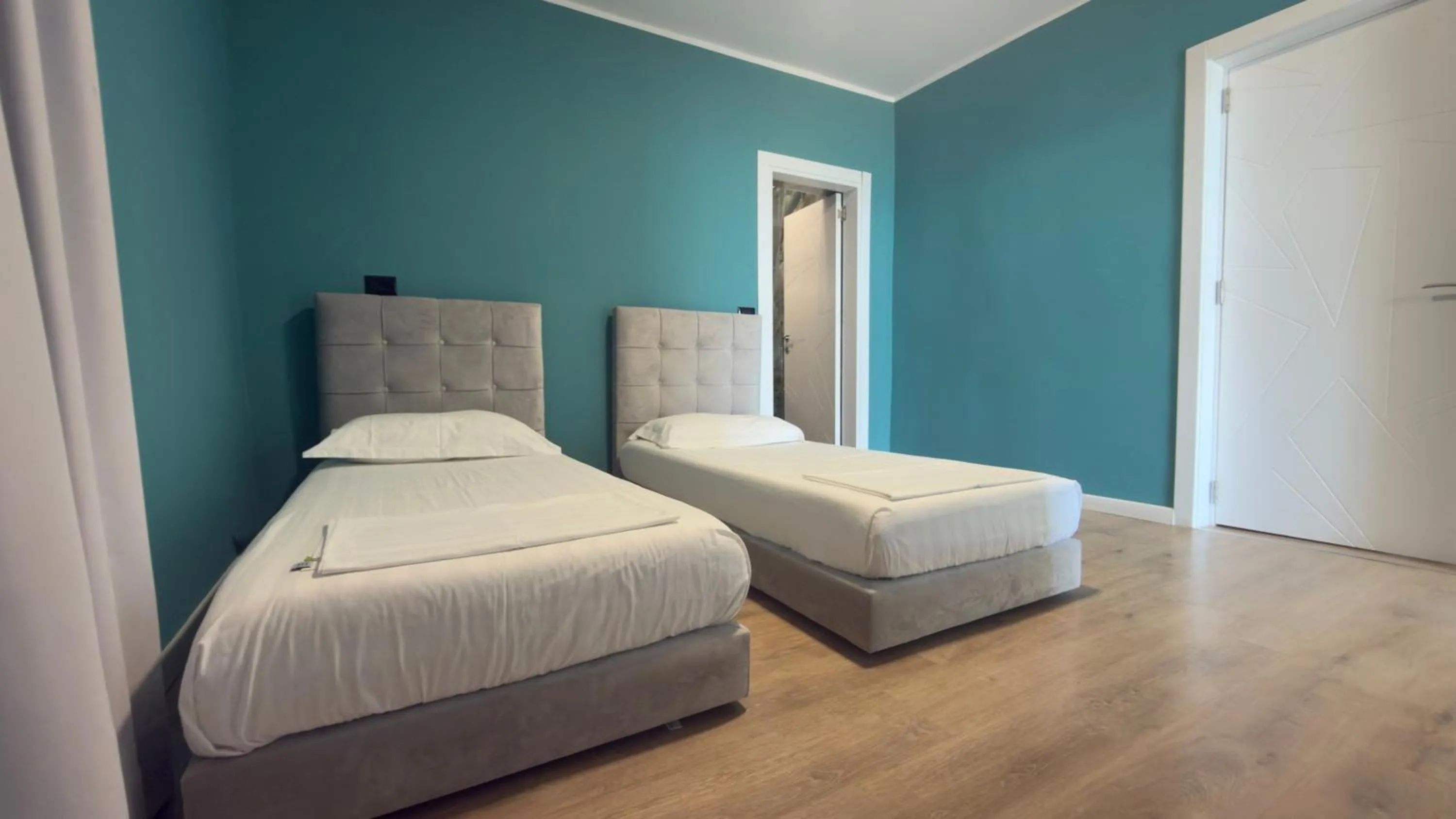 Bed in Hotel Zhironi