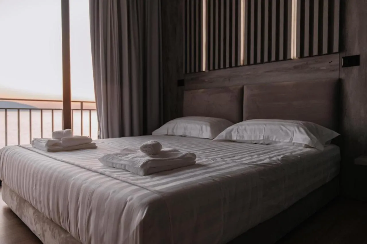 Bed in Hotel Zhironi