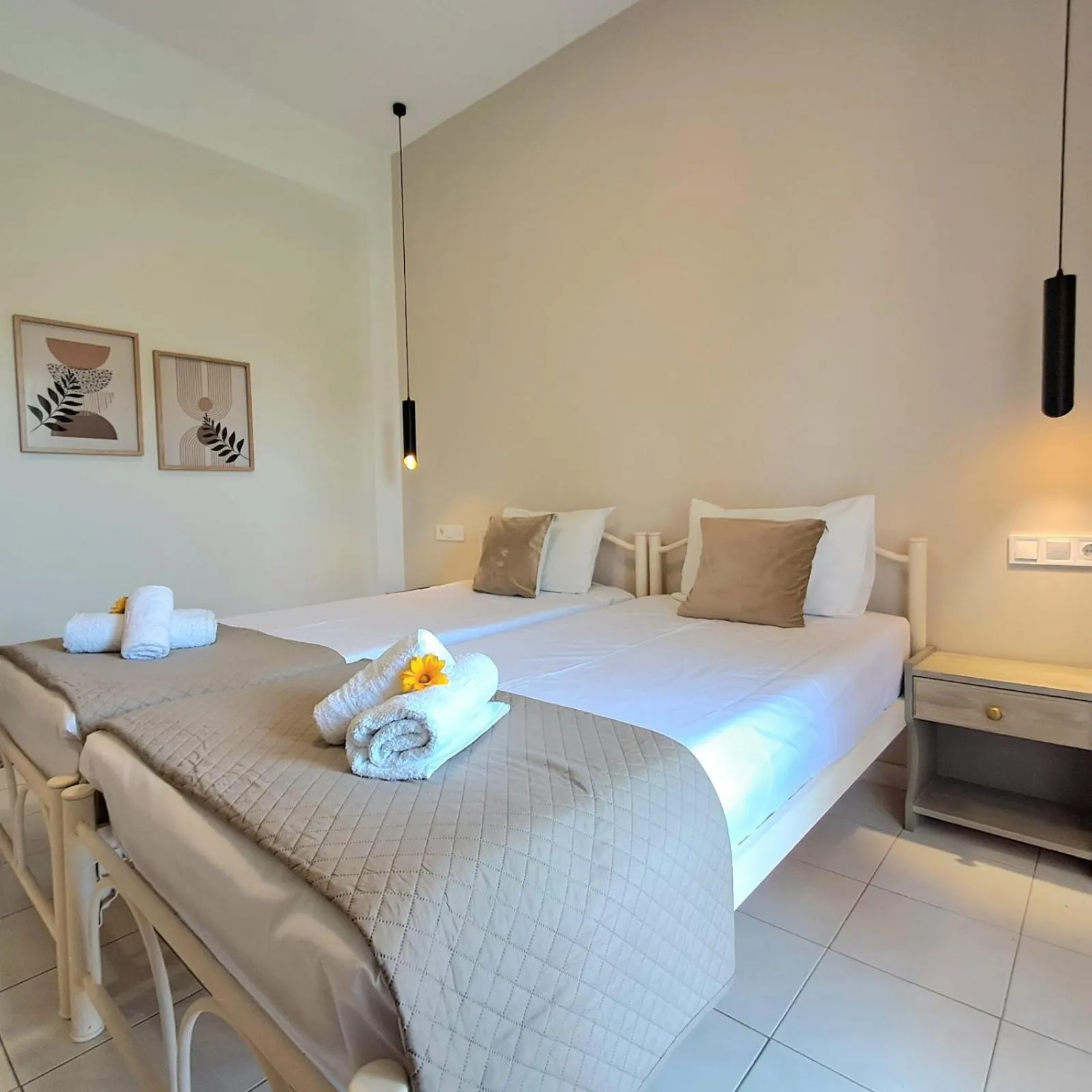 Bed in Olga's Garden Apartments