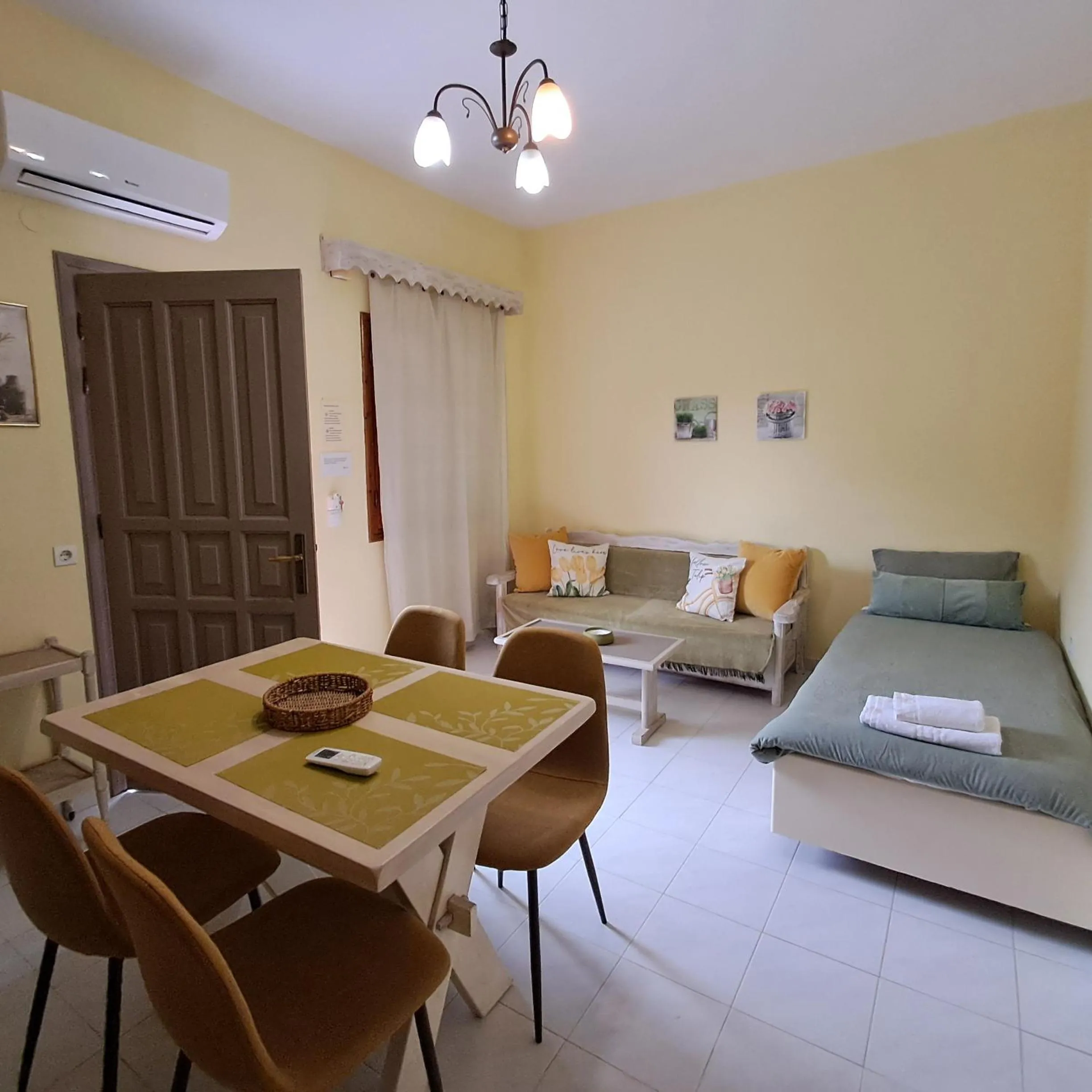 Living room, Bed in Olga's Garden Apartments