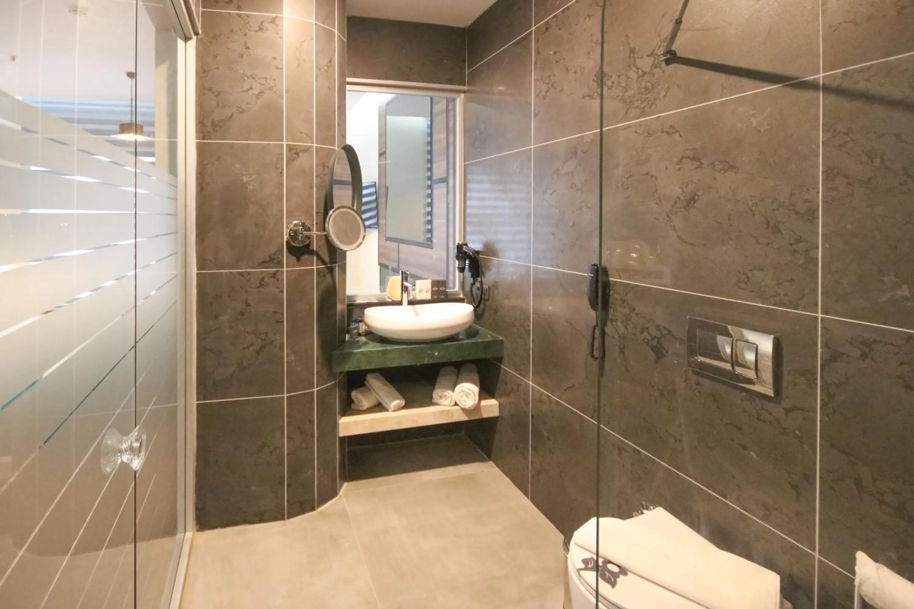 Bathroom in Asia Beach Resort & Spa Hotel