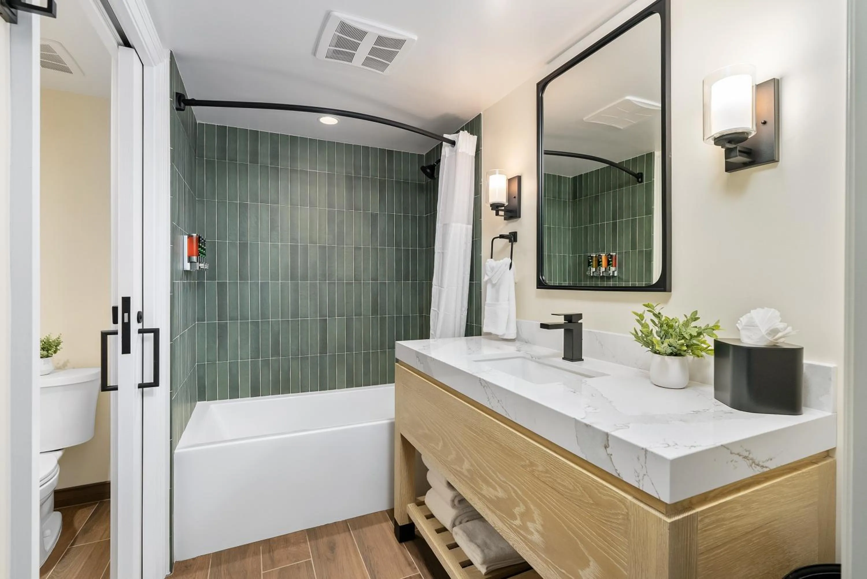 Toilet in Avila Village Inn