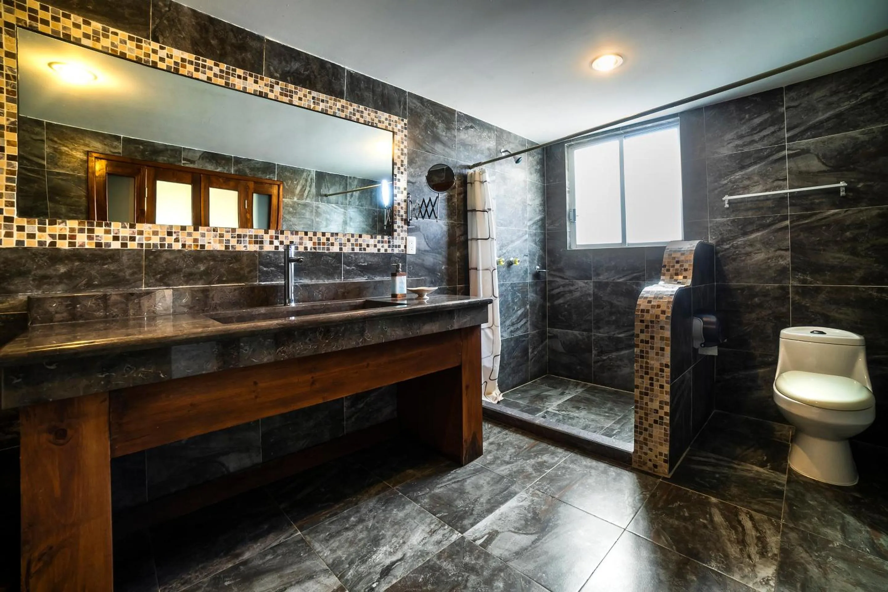 Bedroom in HOTEL XIADANI Restaurante, Temazcal & Spa