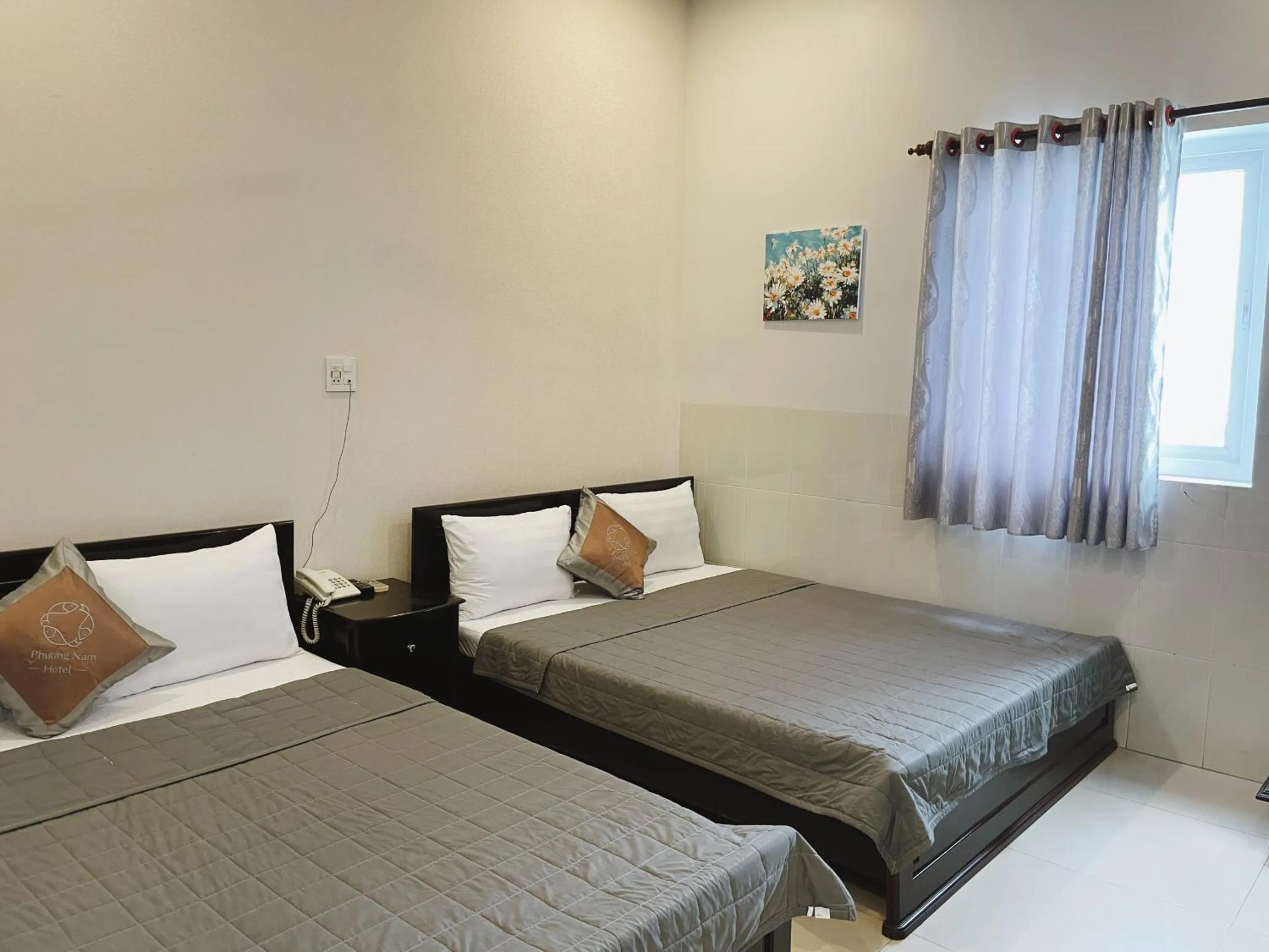 Bed in Phuong Nam Hotel An Giang