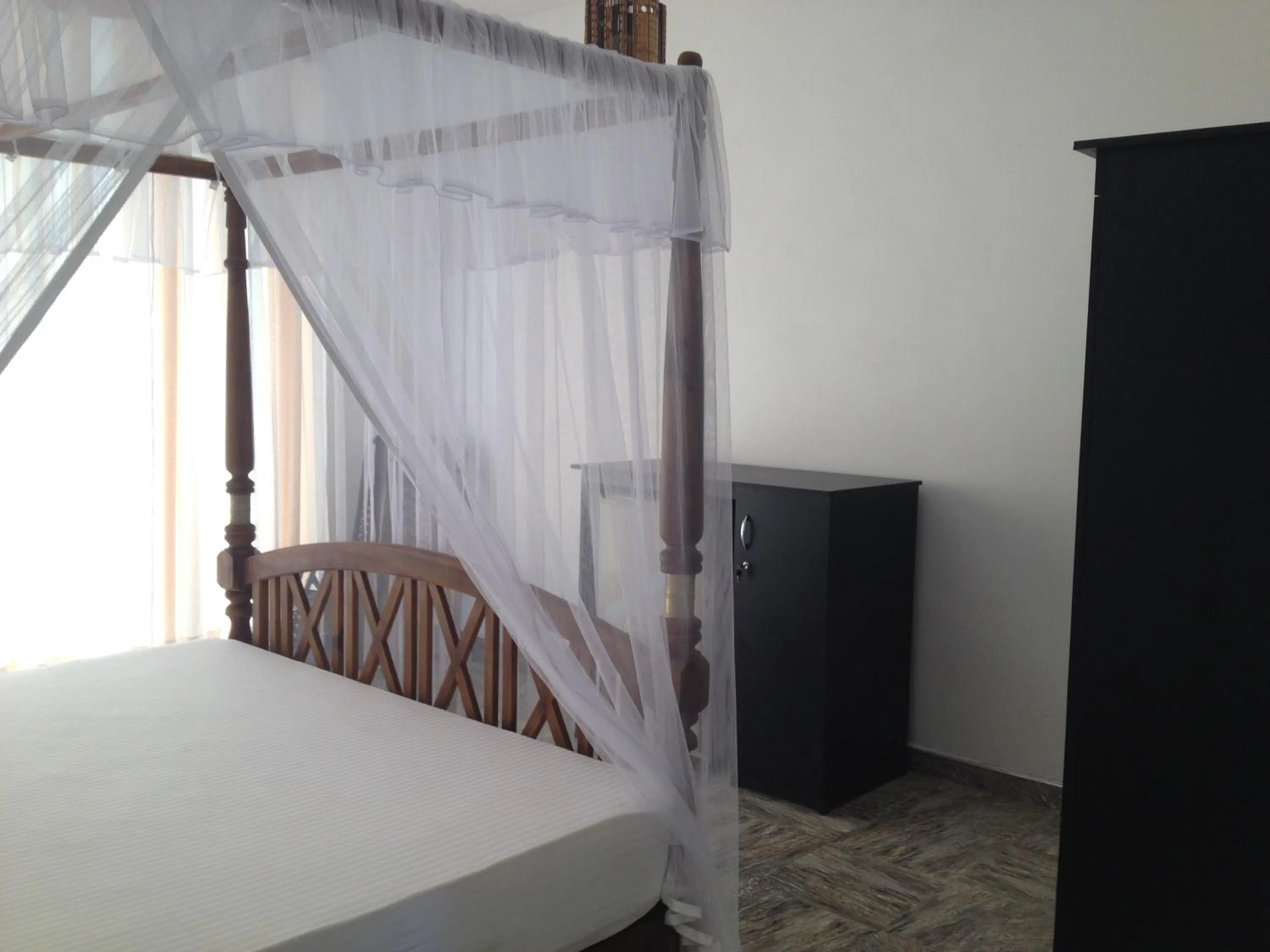 Photo of the whole room, Bed in Mirissa Seastar