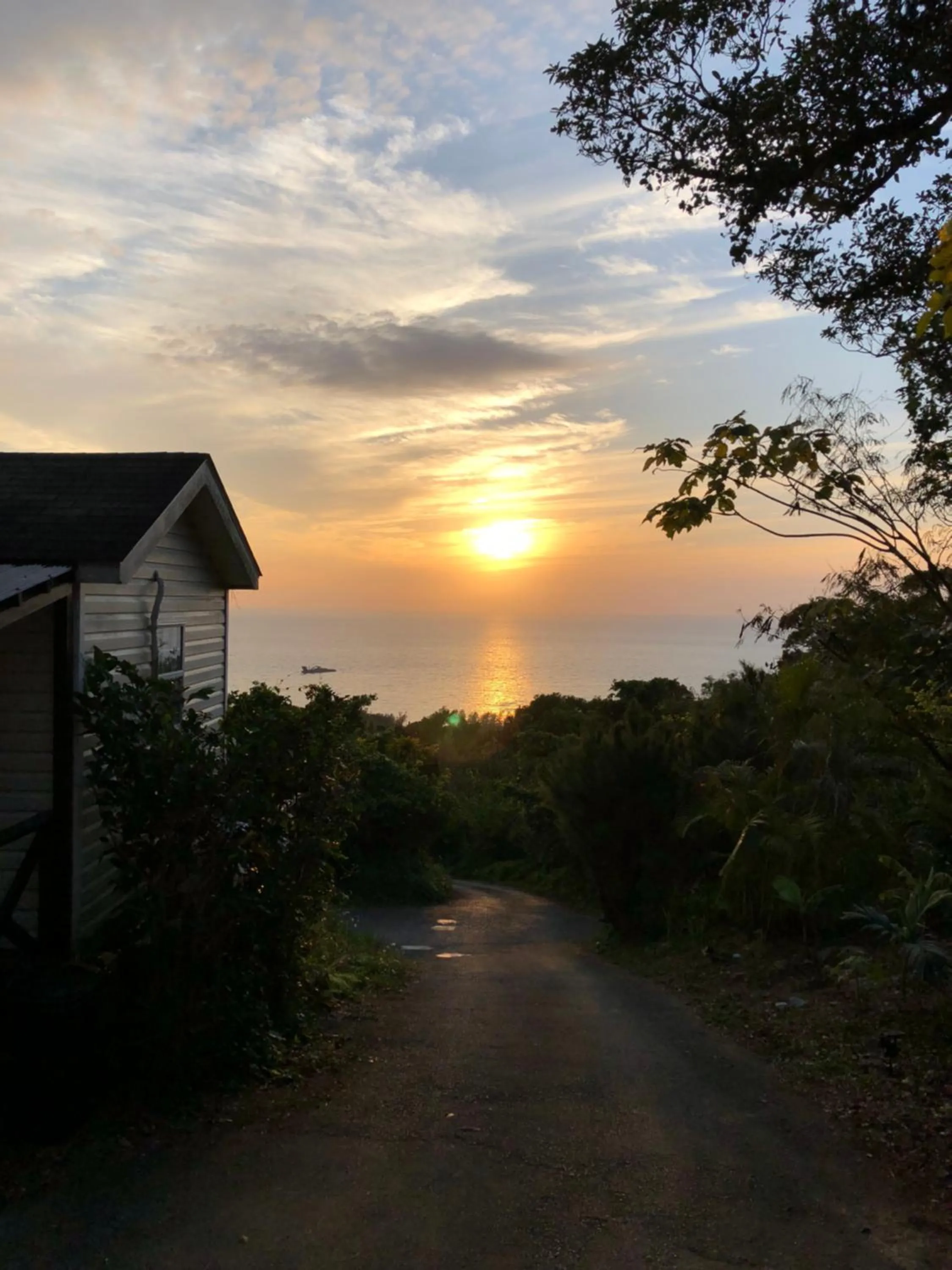 Sunset in PANORAMA Ocean View Cottage