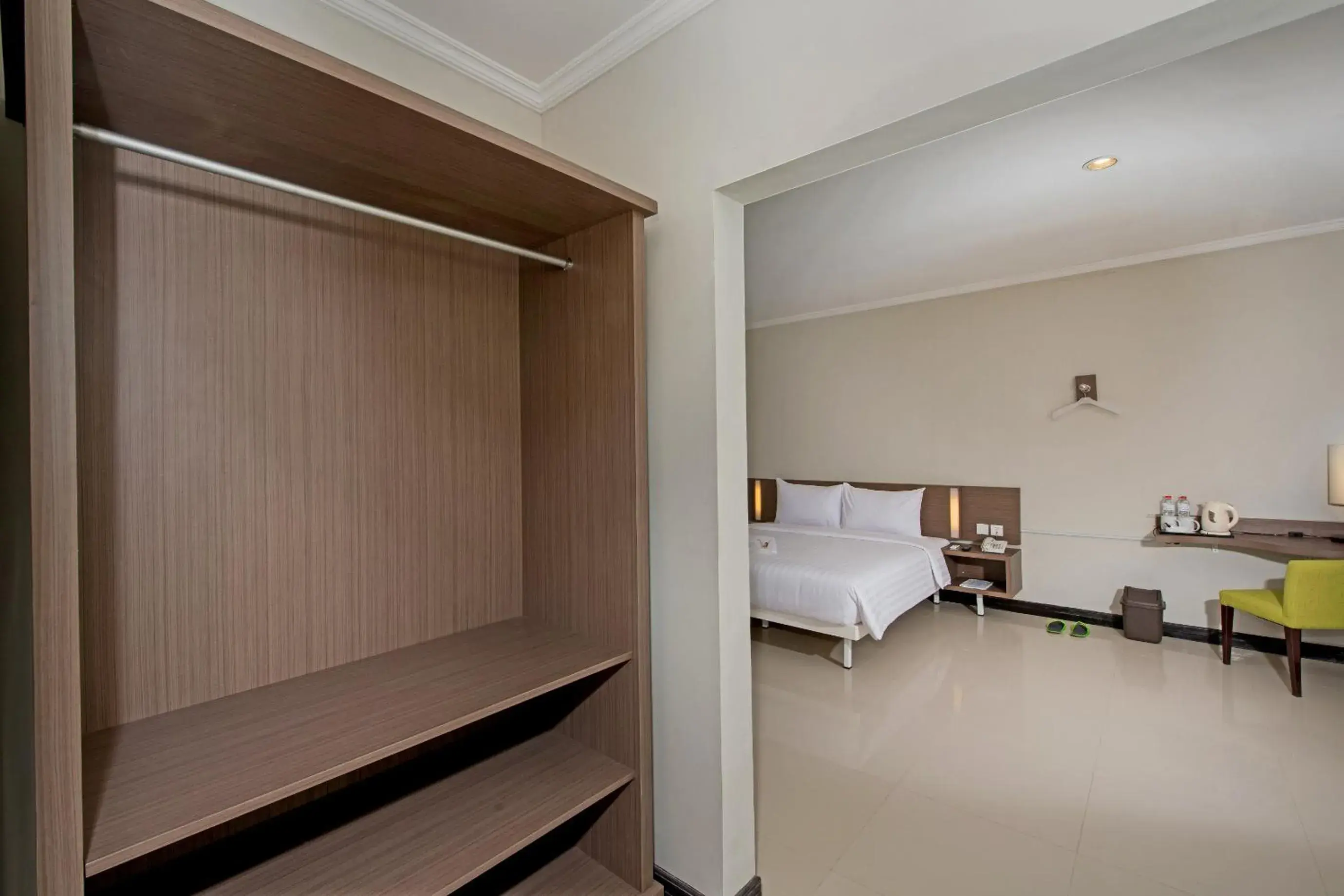 Bed, Bathroom in Whiz Prime Hotel Darmo Harapan Surabaya