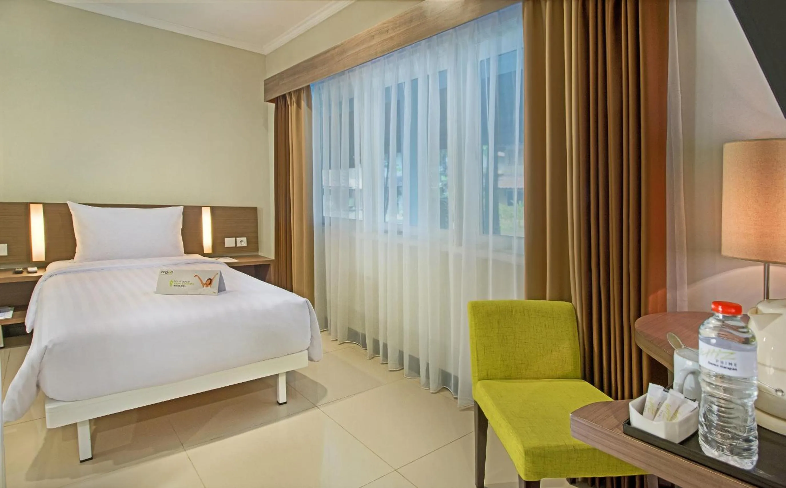 Bed in Whiz Prime Hotel Darmo Harapan Surabaya