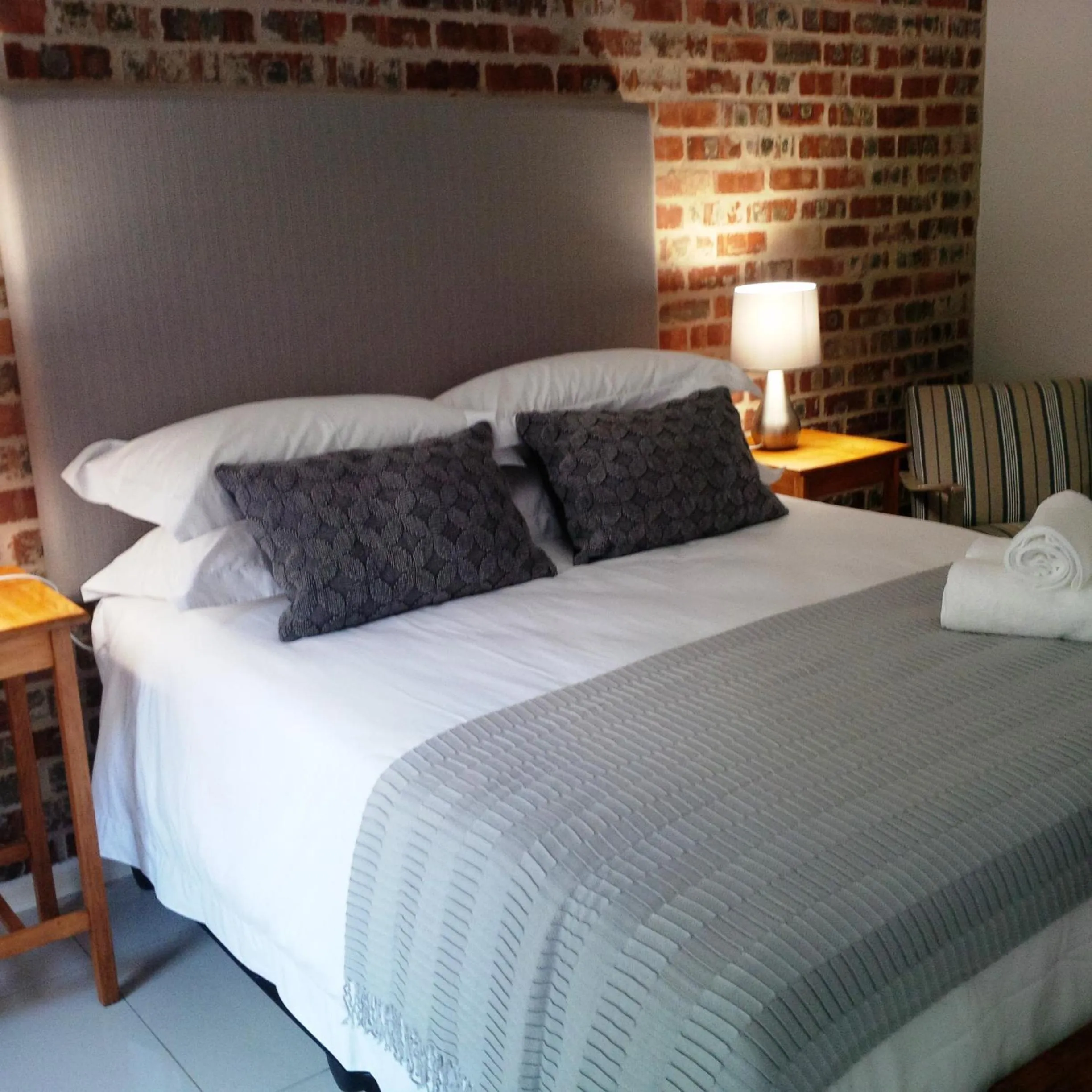 Bed in The Garden Shed Guest House